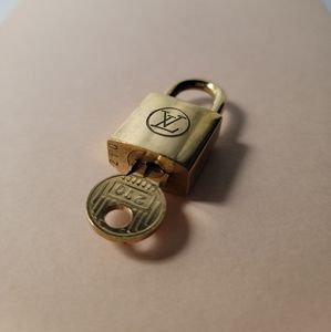 VINTAGE LOUIE VUITTON PADLOCK & KEY #210.
